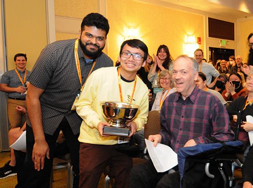 Paolo Pasco, Tournament Victor with Puzzle 8 Constructor Sid Sivakumar and Tournament Director, Will Shortz